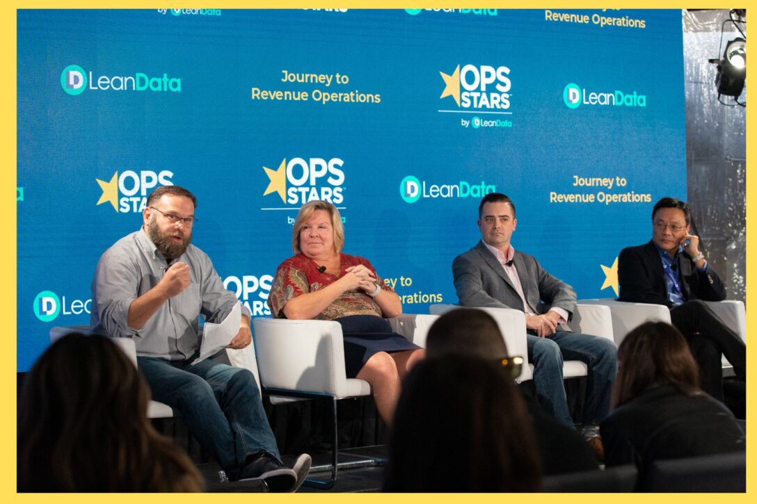 a panel of operations experts speaking at an OpsStars Conference